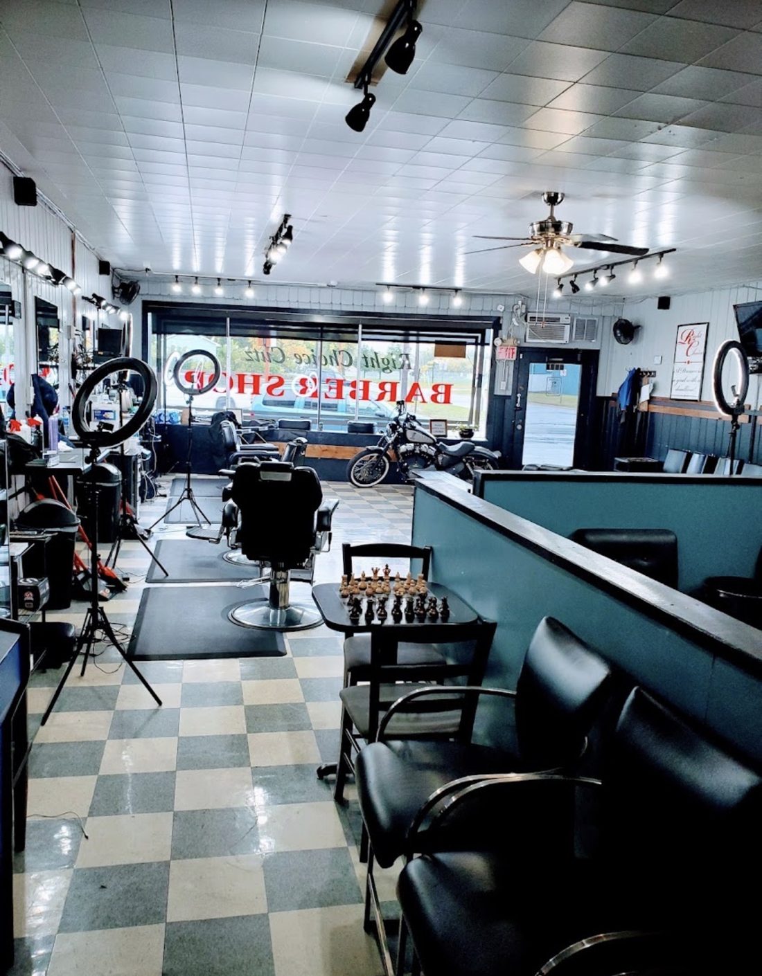 Inside the shop: barber chairs and checkerboard floor